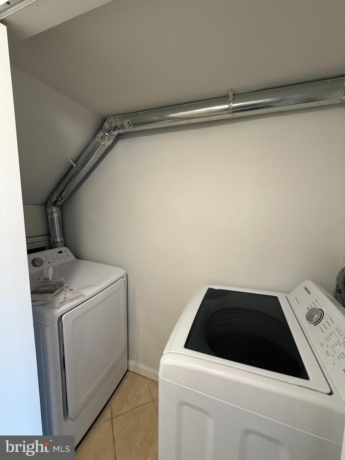1714 E Street Northeast Washington, DC 20002 - Photo 25 of 30 a utility room with dryer and washer