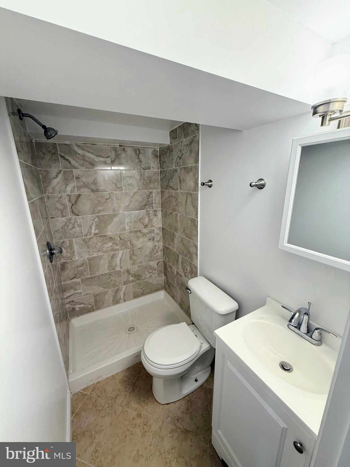 1714 E Street Northeast Washington, DC 20002 - Photo 26 of 30 a bathroom with a sink a toilet and shower