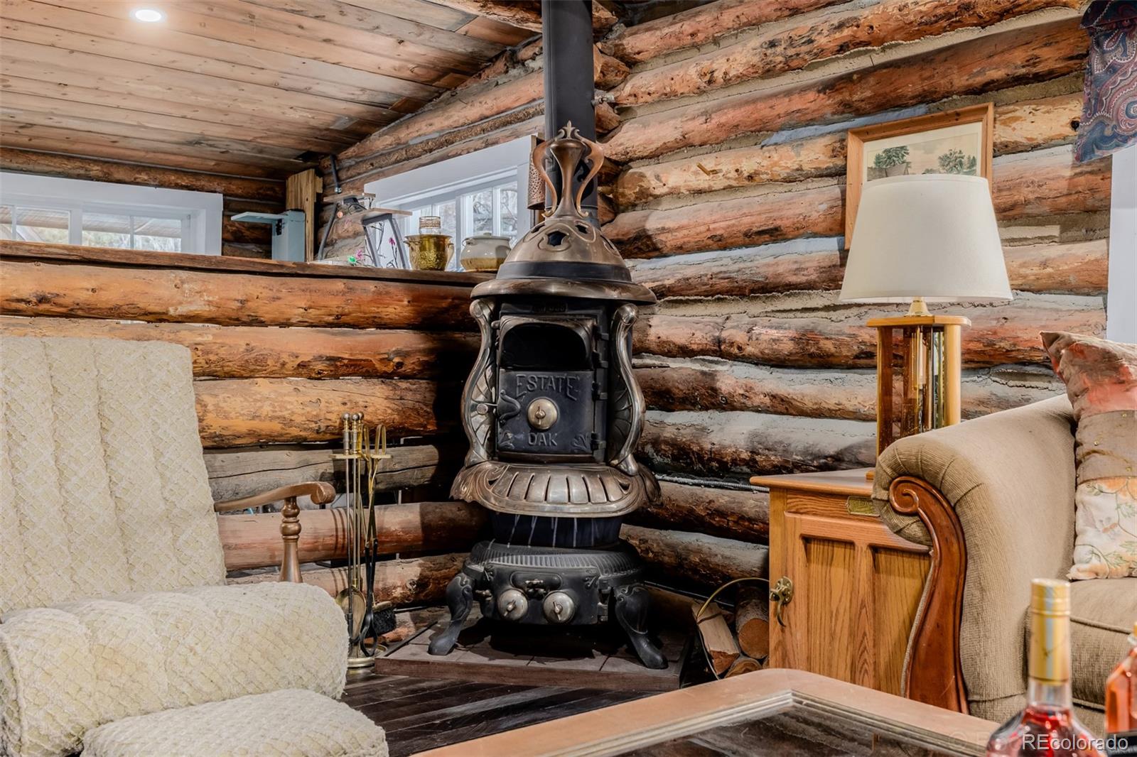 9719 Beaver Pond Conifer, CO 80433 - Photo 13 of 50 a living room with furniture