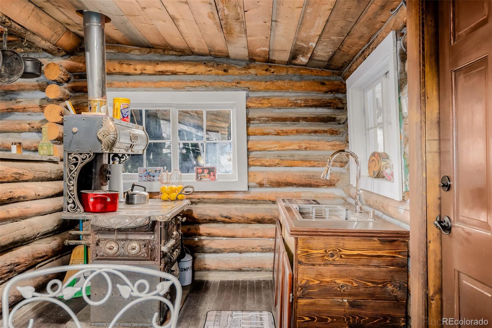 9719 Beaver Pond Conifer, CO 80433 - Photo 18 of 50 a view of storage and utility room
