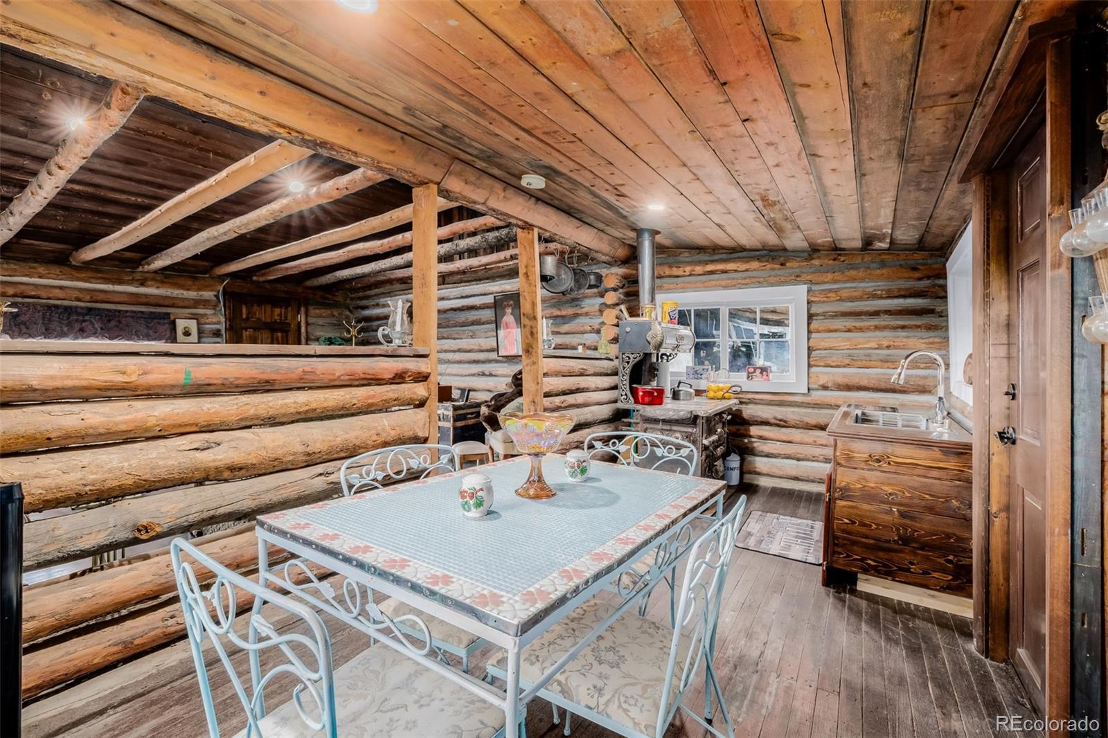 9719 Beaver Pond Conifer, CO 80433 - Photo 20 of 50 a outdoor space with furniture