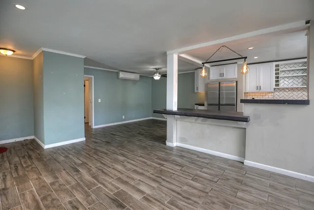 a bathroom with a sink and mirror