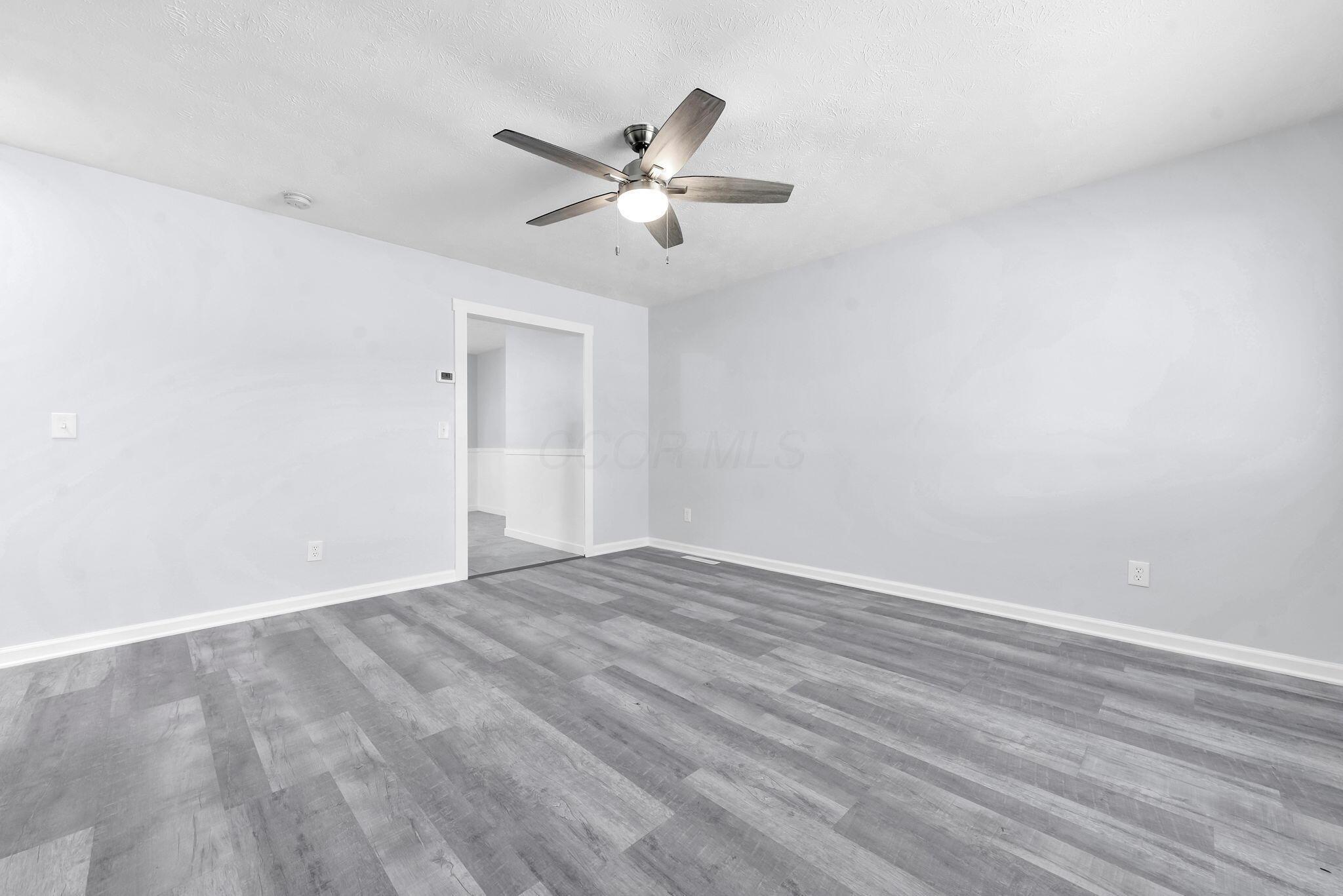 216 Redmond Road Columbus, OH 43228 - Photo 5 of 26 living room w/new floors