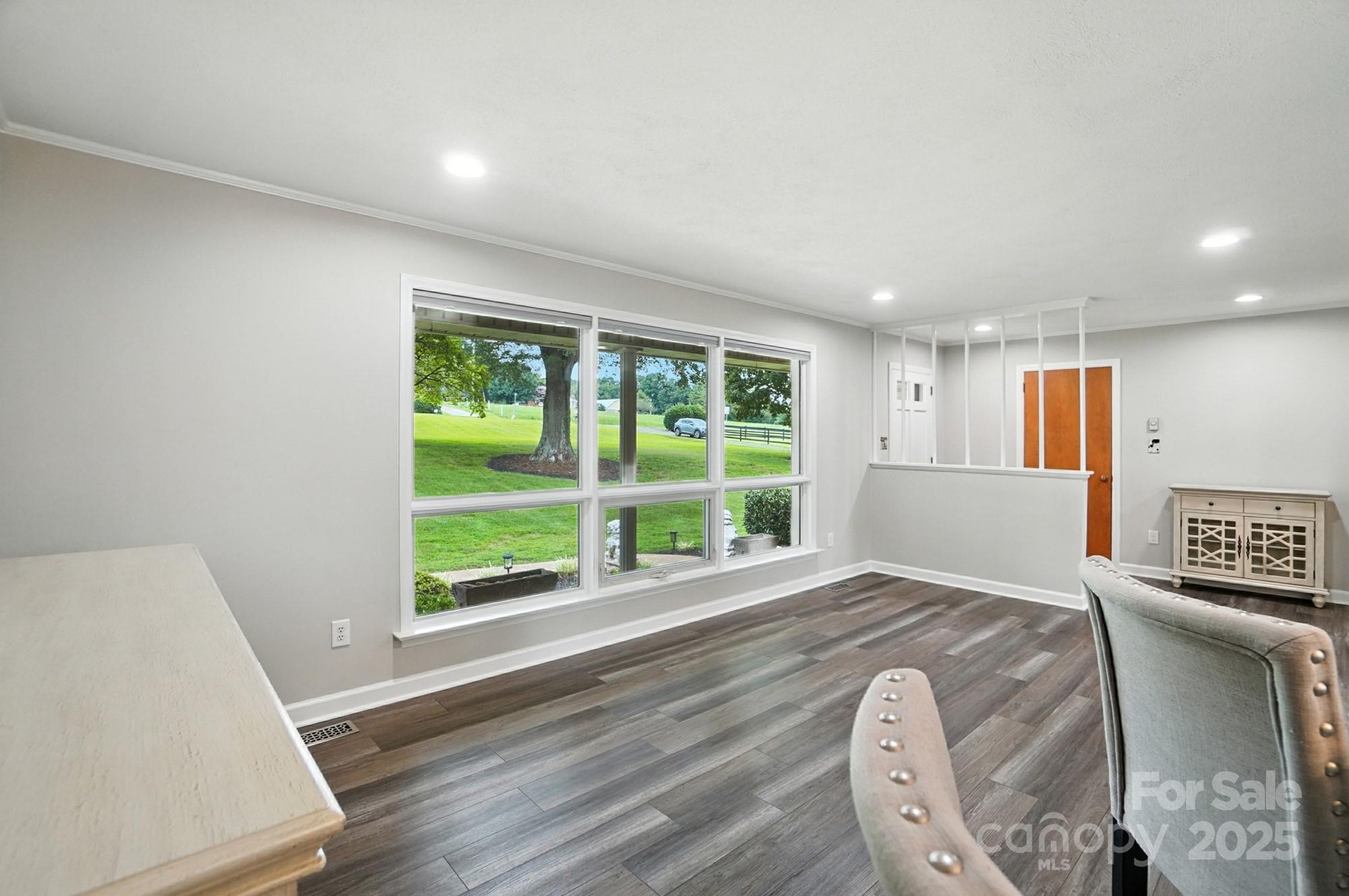 256 Johnson Dairy Road Davidson, NC 28036 - Photo 8 of 44 a view of livingroom with furniture wooden floor and window