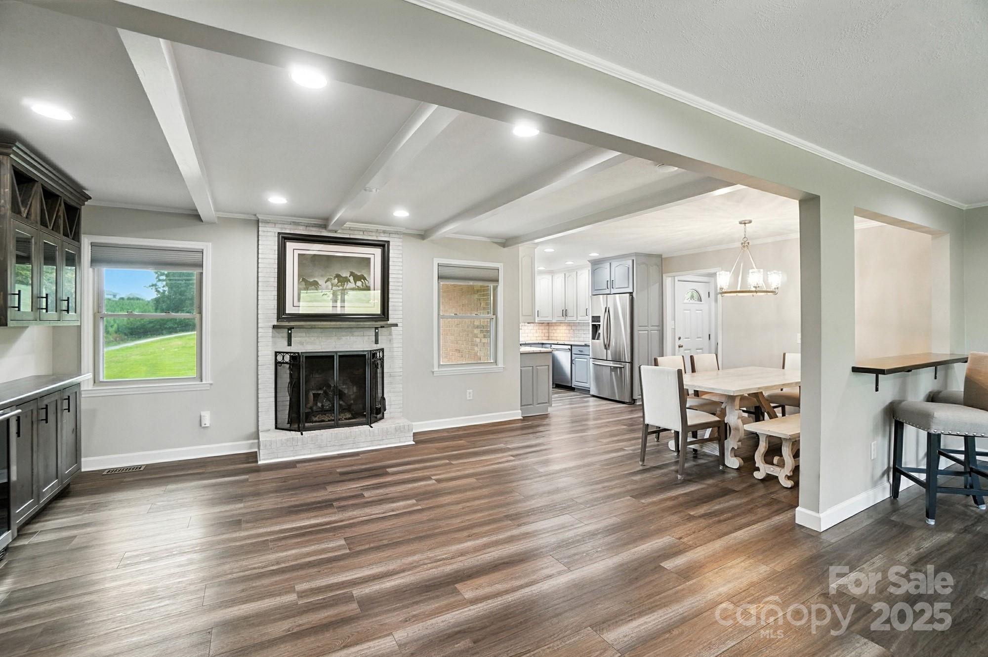 256 Johnson Dairy Road Davidson, NC 28036 - Photo 10 of 44 a view of a livingroom with furniture and a fireplace