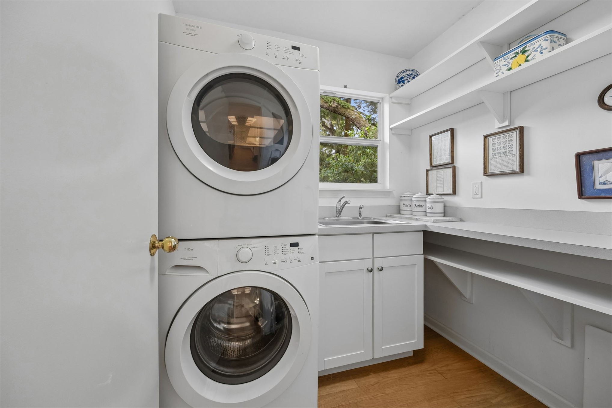 3110 Egans Bluff Road Fernandina Beach, FL 32034 - Photo 10 of 26 Conveniently located, the laundry is just off the kitchen. Washer & dryer stay.