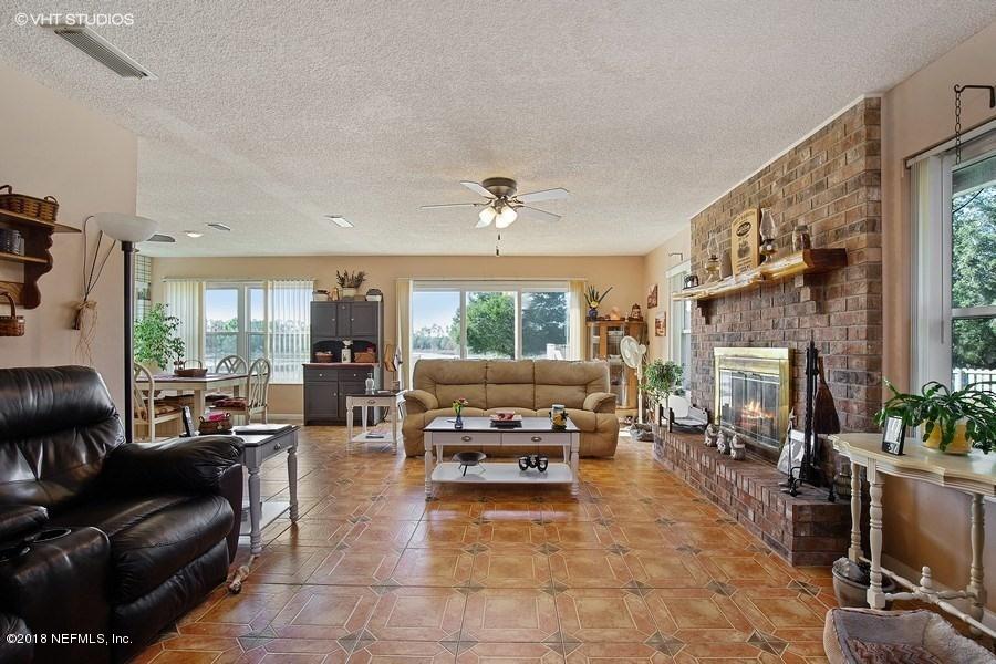 144 Clear Lake Road Crescent City, FL 32112 - Photo 11 of 35 03_144ClearLakeRd_1_LivingRoom_LowRes