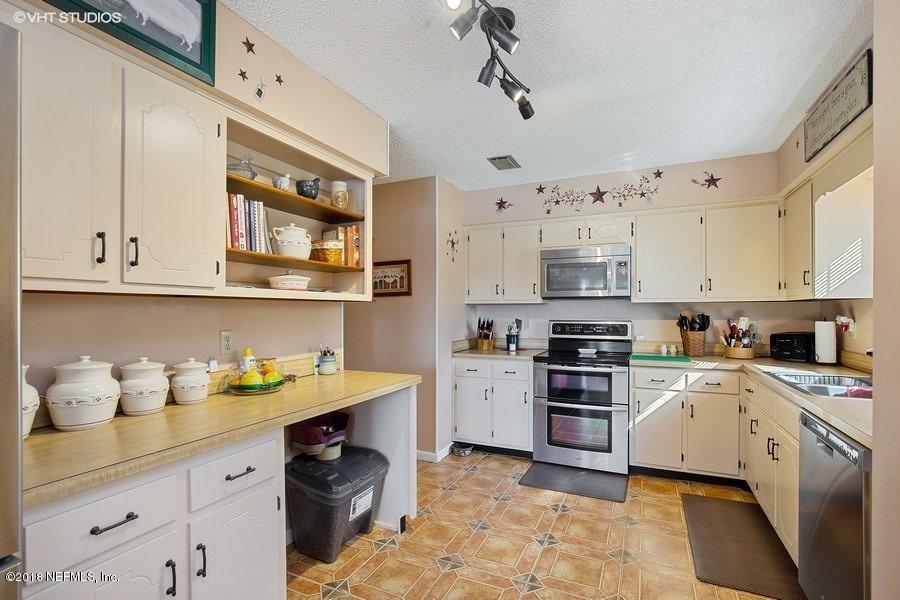 144 Clear Lake Road Crescent City, FL 32112 - Photo 13 of 35 05_144ClearLakeRd_5_Kitchen_LowRes