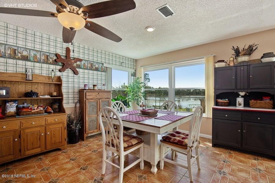 144 Clear Lake Road Crescent City, FL 32112 - Photo 14 of 35 06_144ClearLakeRd_369001_DiningRoom_LowR