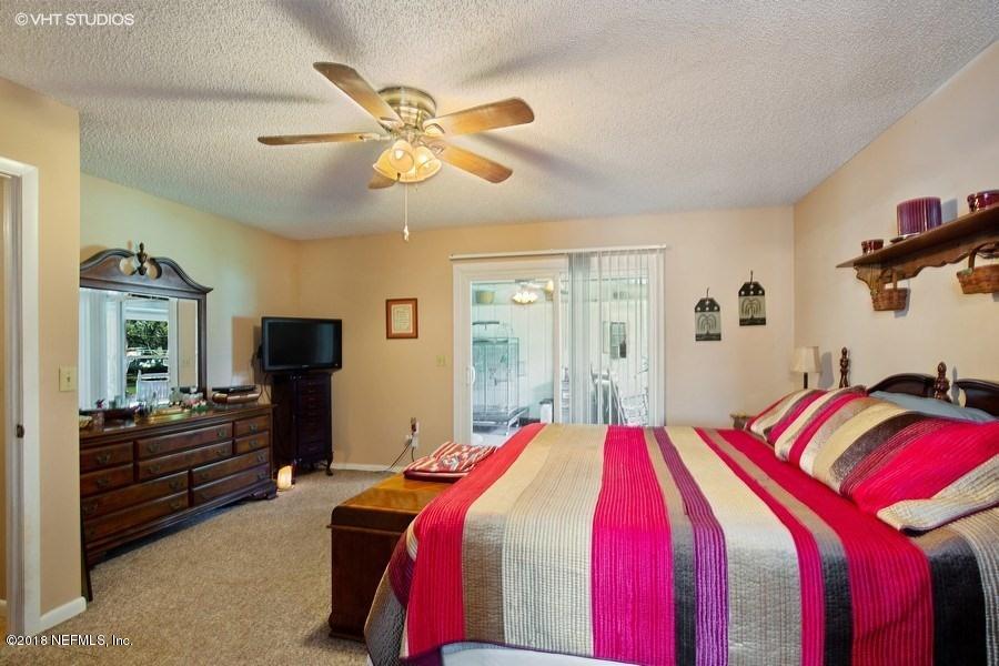 144 Clear Lake Road Crescent City, FL 32112 - Photo 15 of 35 09_144ClearLakeRd_178002_MasterBedroom_L