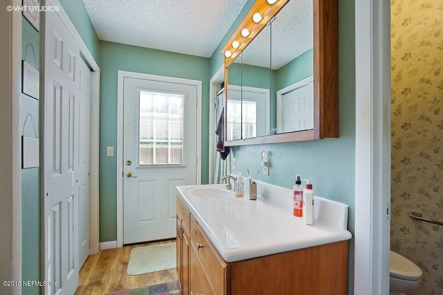 144 Clear Lake Road Crescent City, FL 32112 - Photo 18 of 35 10_144ClearLakeRd_13_MasterBathroom_LowR