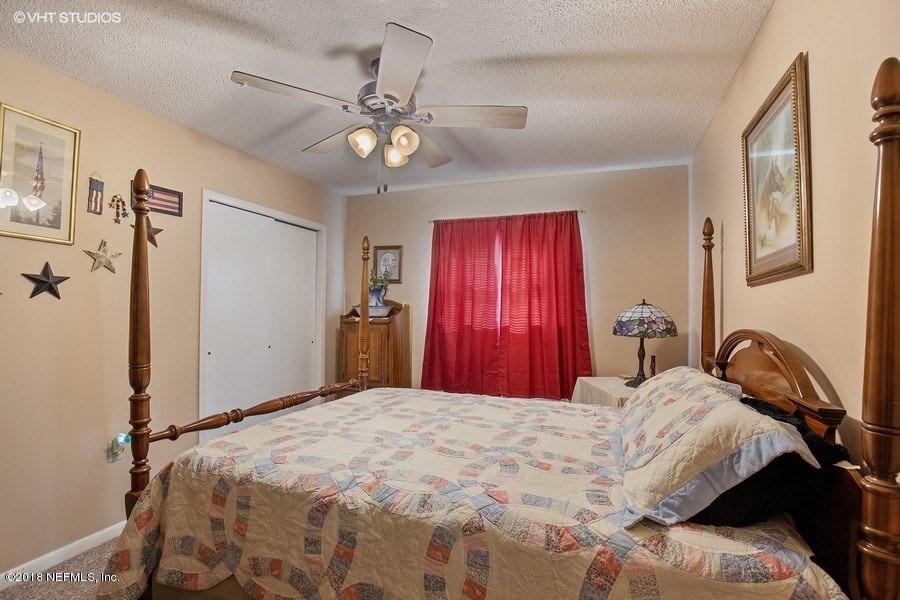 144 Clear Lake Road Crescent City, FL 32112 - Photo 19 of 35 11_144ClearLakeRd_18_Bedroom_LowRes