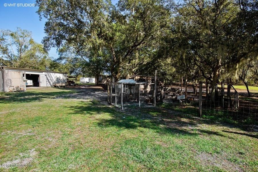 144 Clear Lake Road Crescent City, FL 32112 - Photo 23 of 35 14_144ClearLakeRd_76_Kennel_LowRes