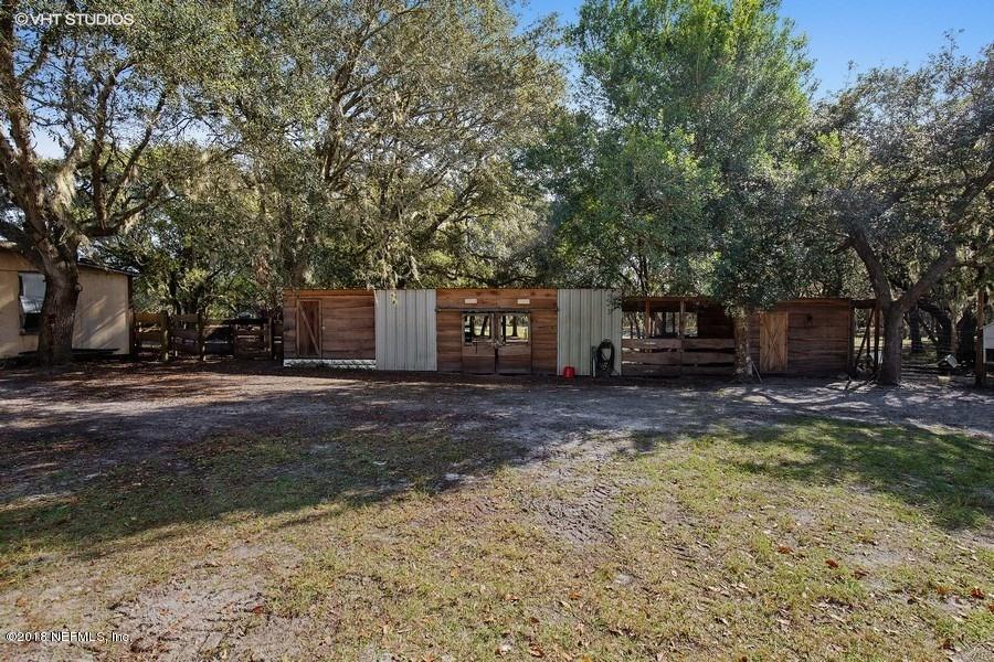 144 Clear Lake Road Crescent City, FL 32112 - Photo 26 of 35 17_144ClearLakeRd_73_HorseStallStables_L
