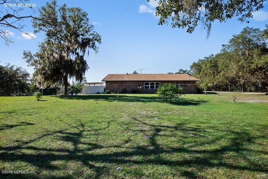 144 Clear Lake Road Crescent City, FL 32112 - Photo 28 of 35 19_144ClearLakeRd_59_RearView_LowRes