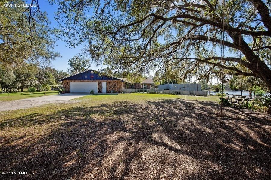 144 Clear Lake Road Crescent City, FL 32112 - Photo 7 of 35 01_144ClearLakeRd_57_FrontView_LowRes