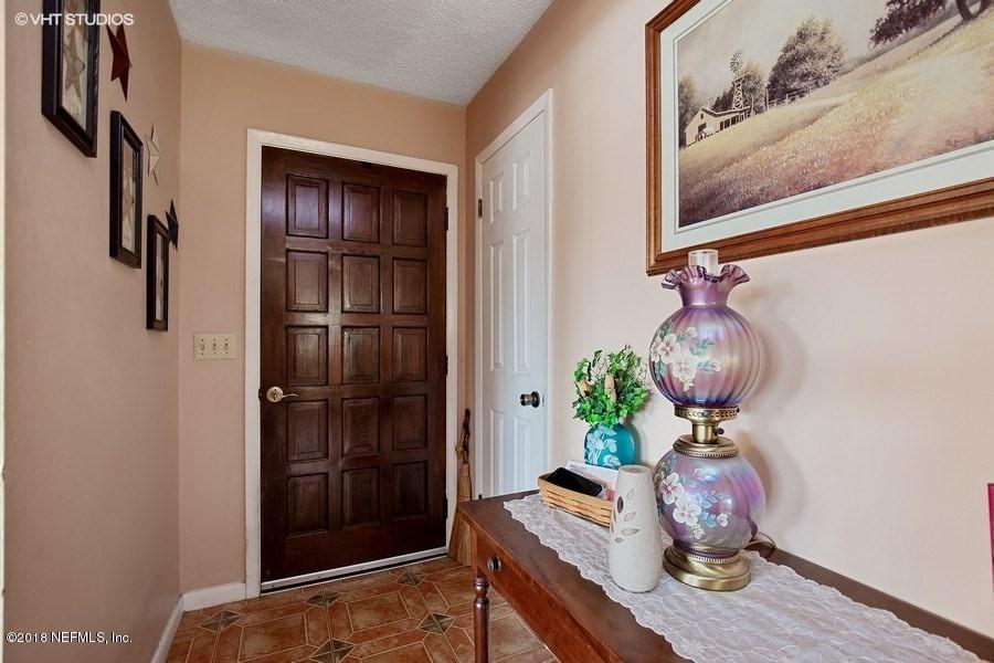 144 Clear Lake Road Crescent City, FL 32112 - Photo 10 of 35 02_144ClearLakeRd_32_Foyer_LowRes