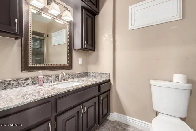 a view of a swimming pool with a table and chairs