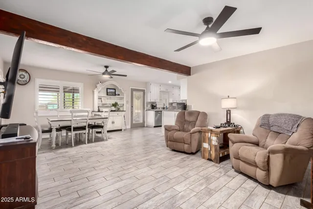 a dining room with furniture and window