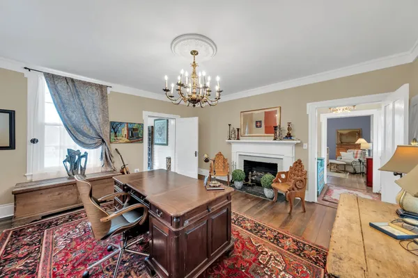 a view of a bedroom with washer and dryer