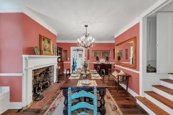 a view of a livingroom with furniture window and wooden floor