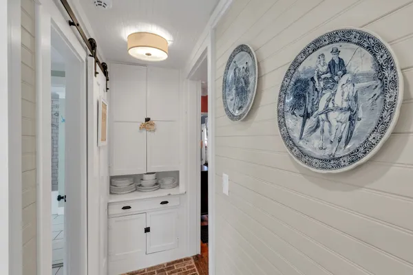 view of a livingroom with wooden floor and a flat screen tv