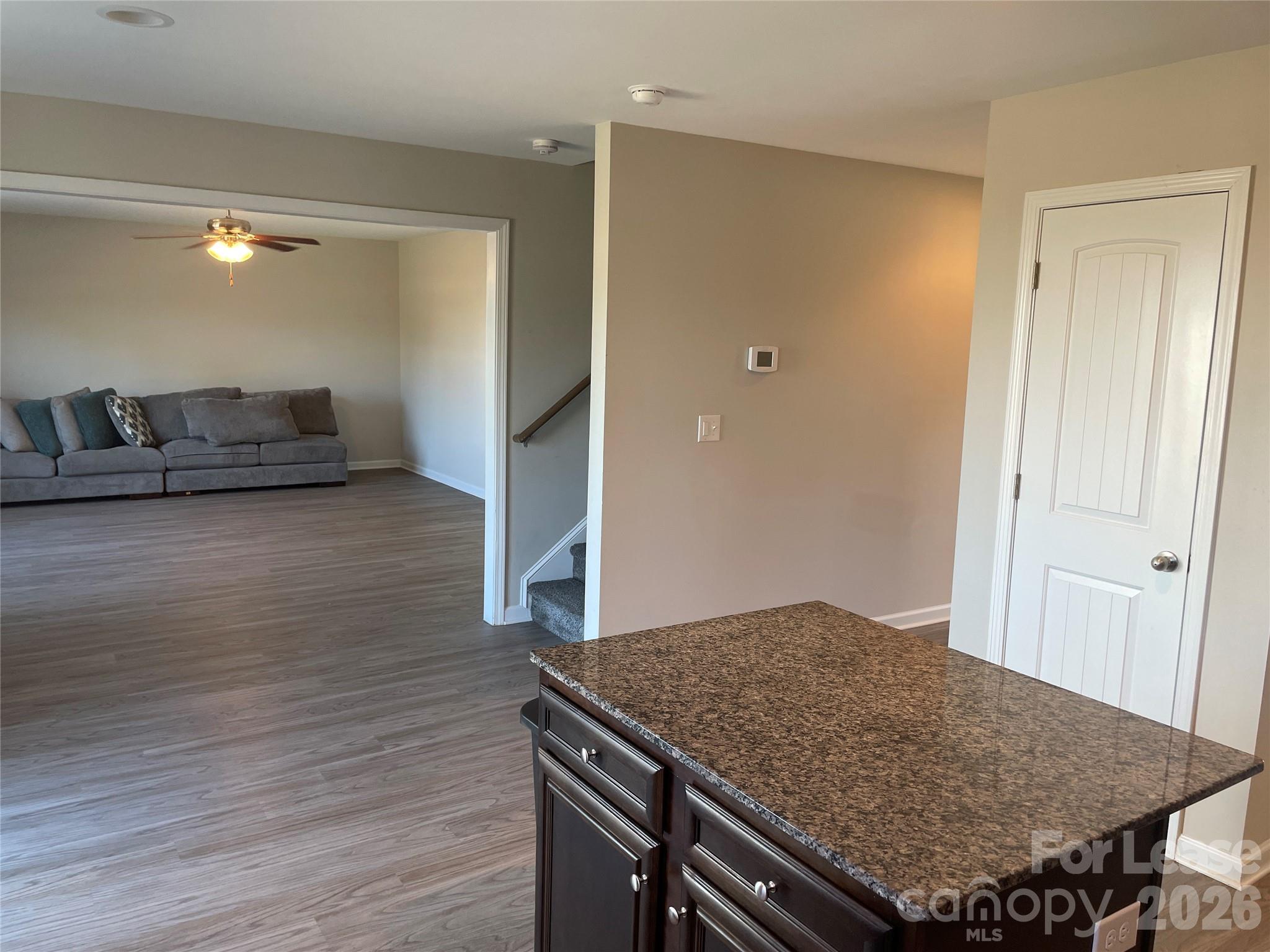 2909 Old Field Road Sumter, SC 29150 - Photo 14 of 39 a view of kitchen island with wooden floor