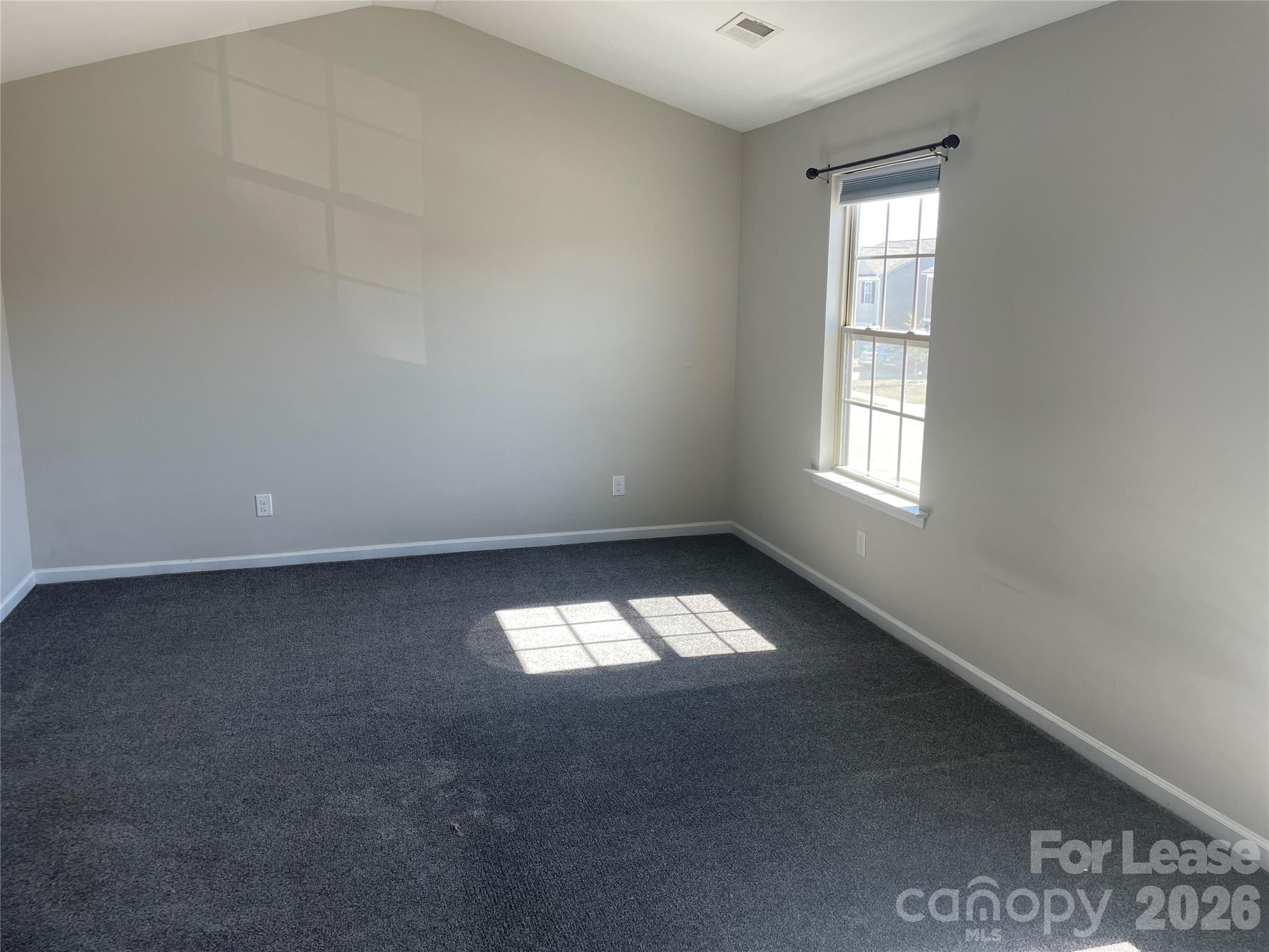 2909 Old Field Road Sumter, SC 29150 - Photo 19 of 39 an empty room with a window