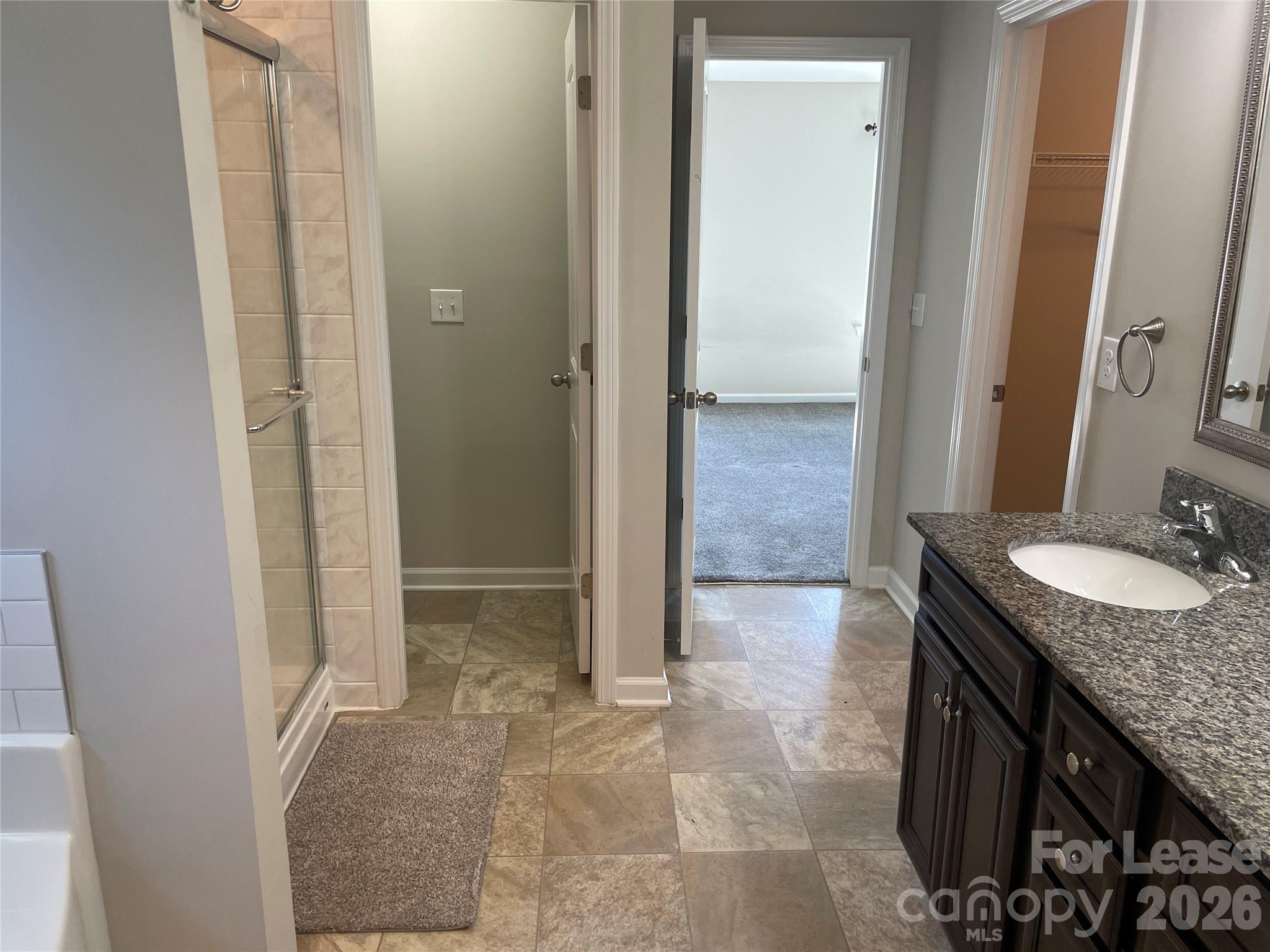 2909 Old Field Road Sumter, SC 29150 - Photo 23 of 39 a bathroom with a granite countertop sink and a mirror
