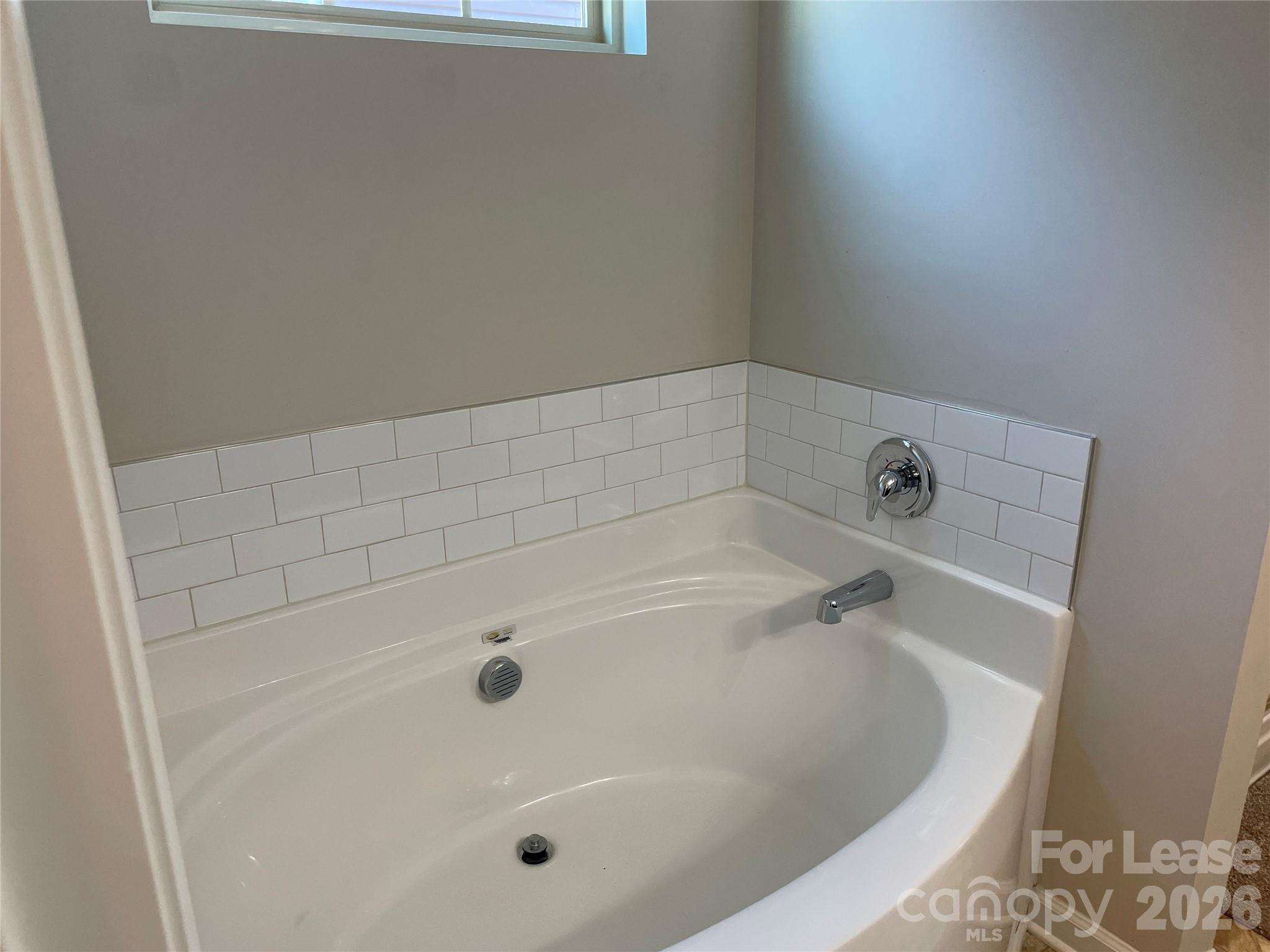 2909 Old Field Road Sumter, SC 29150 - Photo 24 of 39 a bathroom with a tub
