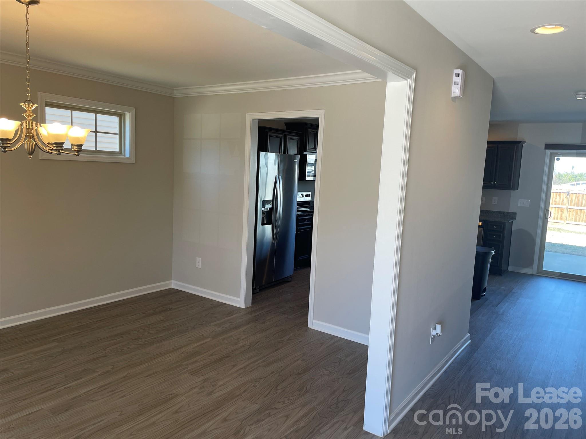 2909 Old Field Road Sumter, SC 29150 - Photo 4 of 39 a view of a hallway with wooden floor and closet