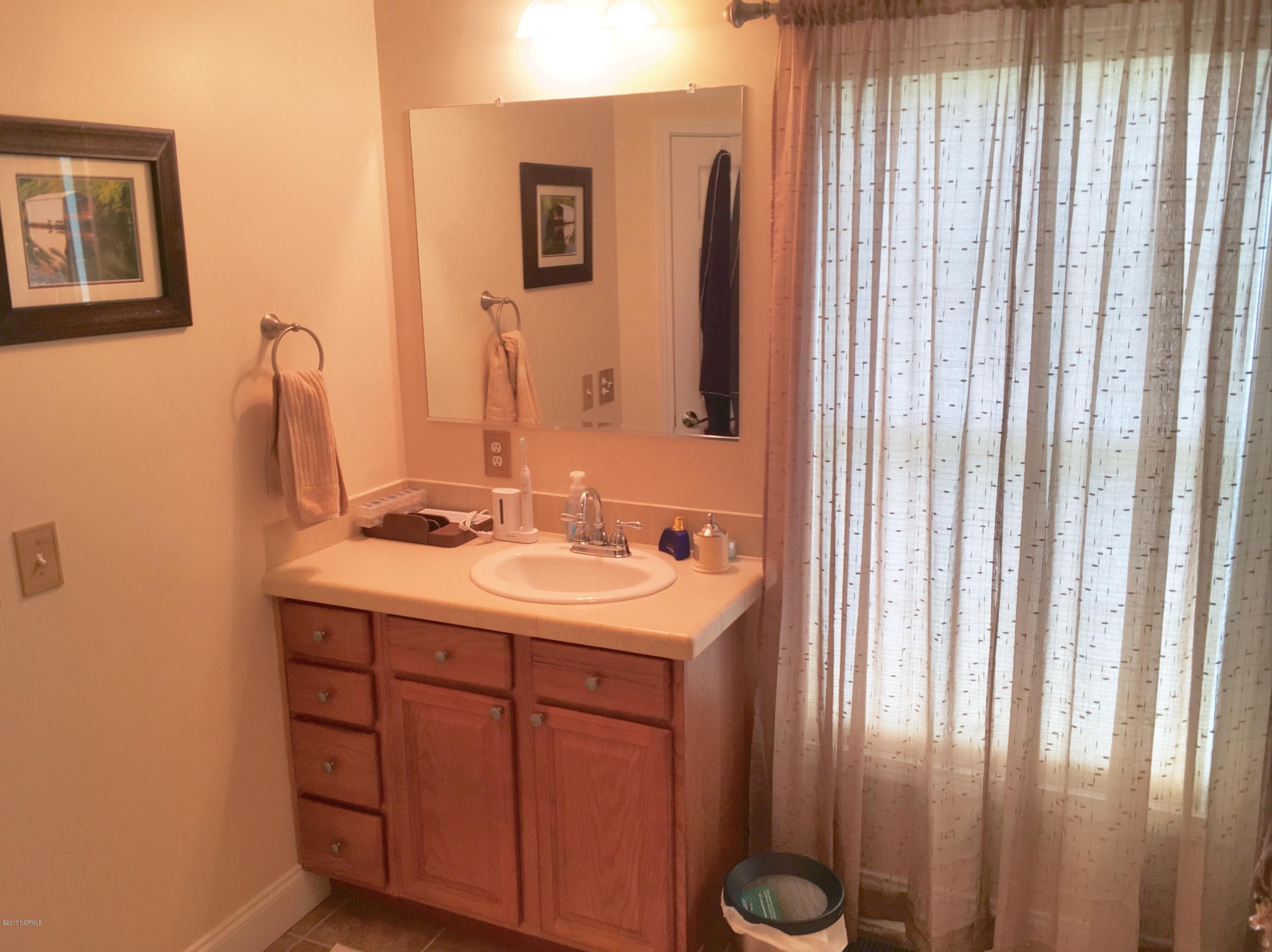 2949 Whichards Beach Road Chocowinity, NC 27817 - Photo 54 of 106 his bathroom