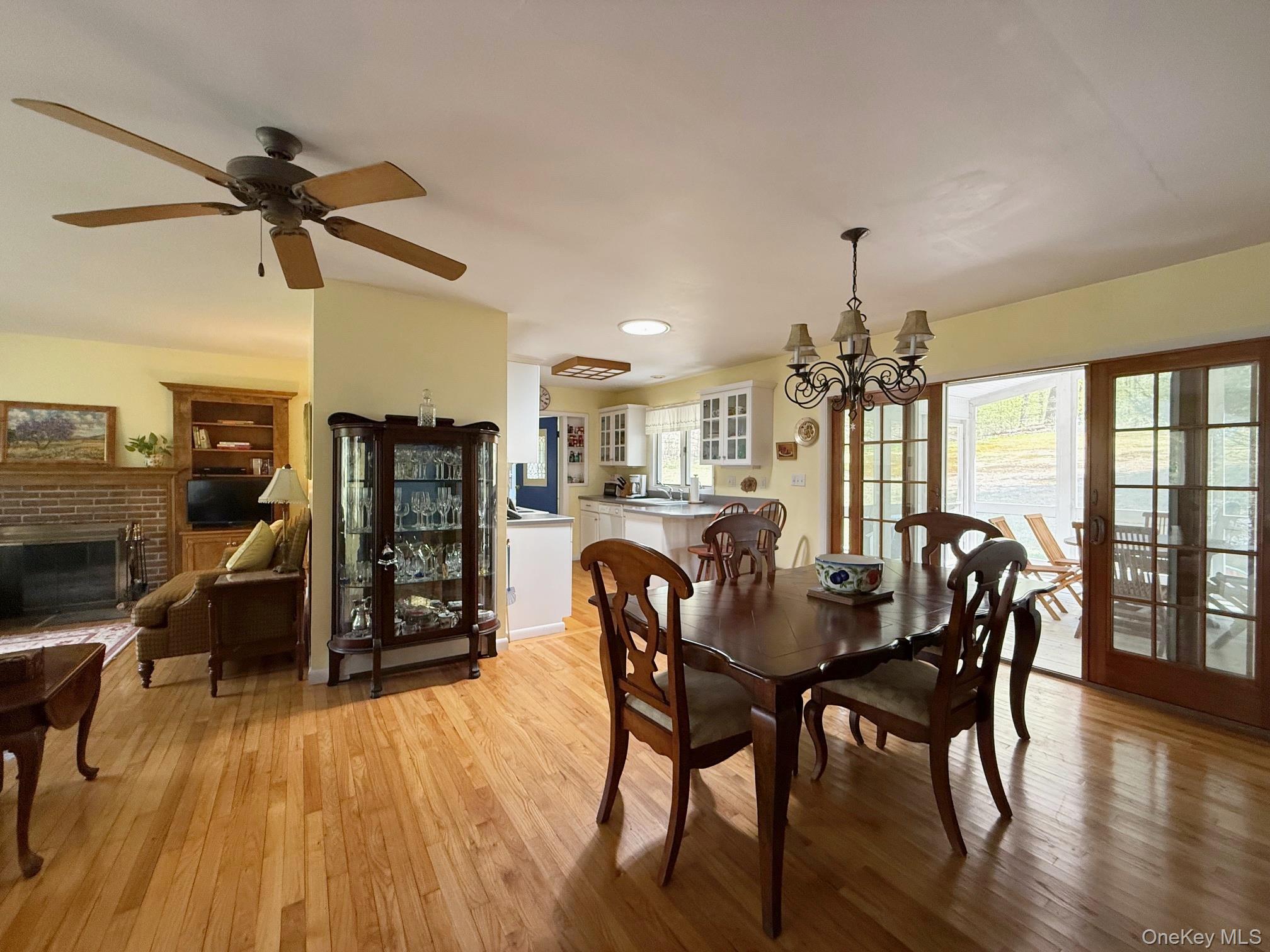 230 Cooper Road Millerton, NY 12546 - Photo 9 of 20 a view of a dining room with furniture and wooden floor