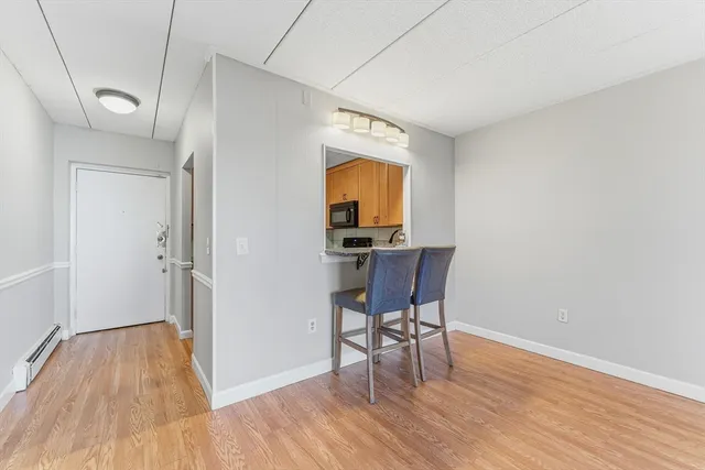 a view of a livingroom with furniture and wooden floor