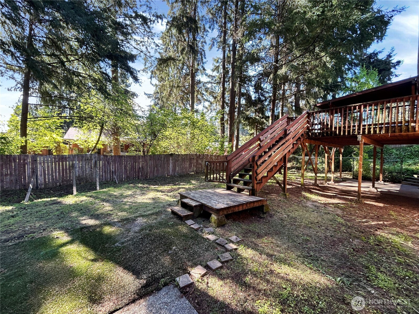 7305 38th Loop Southeast Lacey, WA 98503 - Photo 30 of 32 a view of a park with iron fence