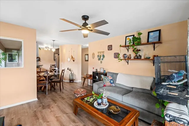 a kitchen with stainless steel appliances granite countertop a refrigerator a sink and dishwasher