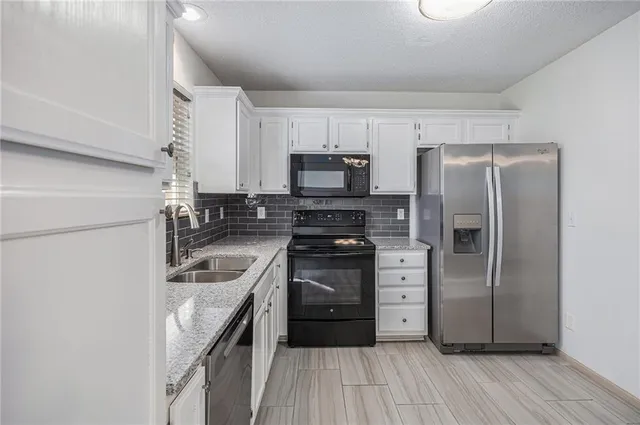 $195,000 | 1324 Southeast Norwood Drive, Lee's Summit, MO 64081