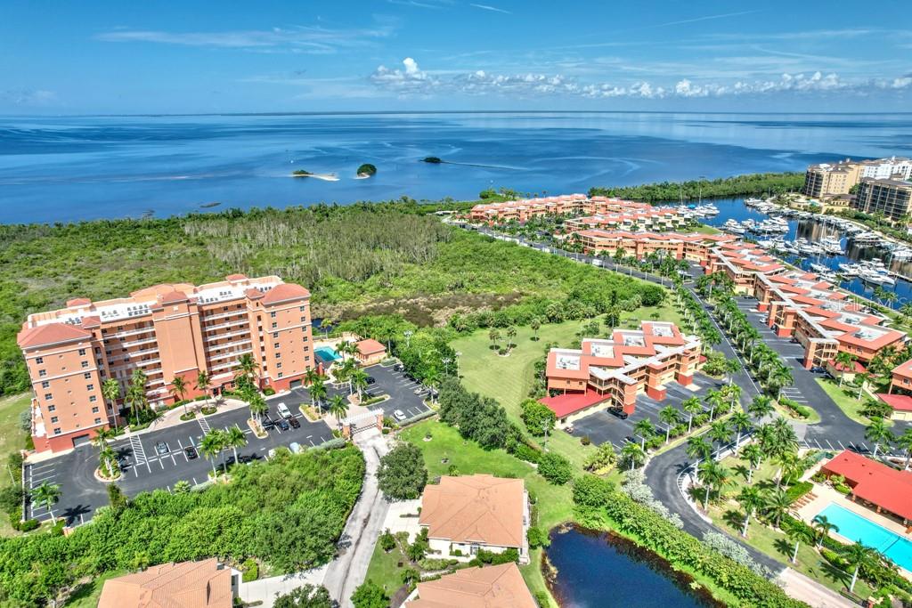 3181 Matecumbe Key Road, Unit 32 Punta Gorda, FL 33955 - Photo 7 of 42 a view of a back yard from a patio