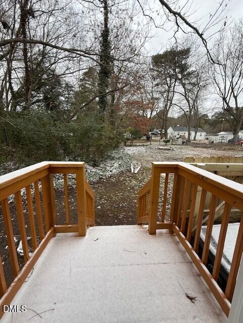 103 Broughton Street Garner, NC 27529 - Photo 15 of 15 a balcony with view of trees