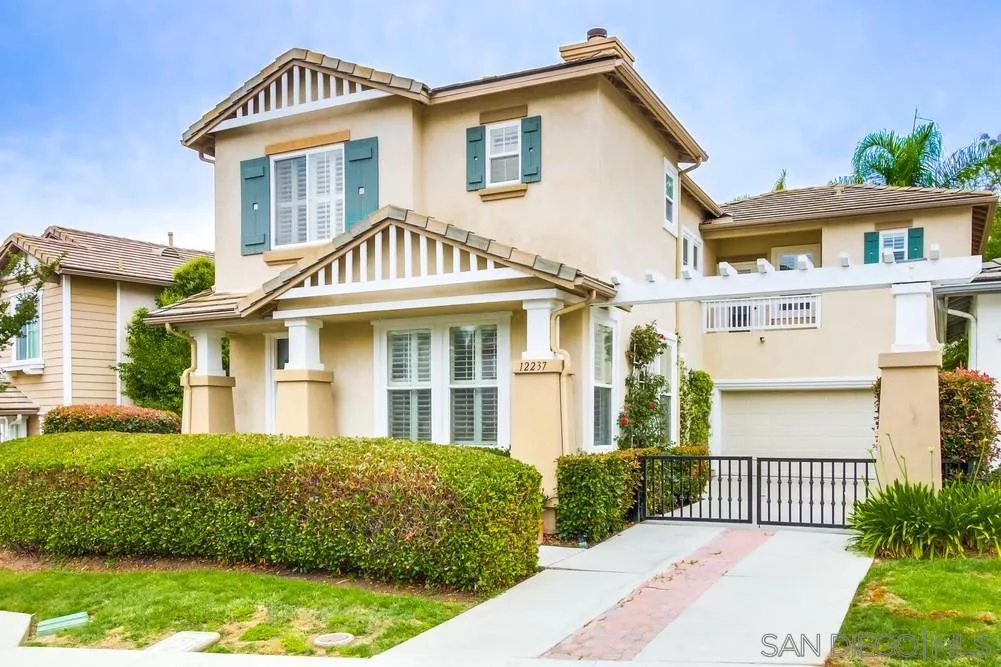 12237 Pepper Tree Lane Poway, CA 92064 - Photo 1 of 25 front view of a house with a yard