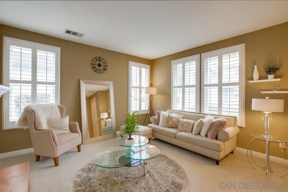 12237 Pepper Tree Lane Poway, CA 92064 - Photo 4 of 25 a living room with furniture and a large window