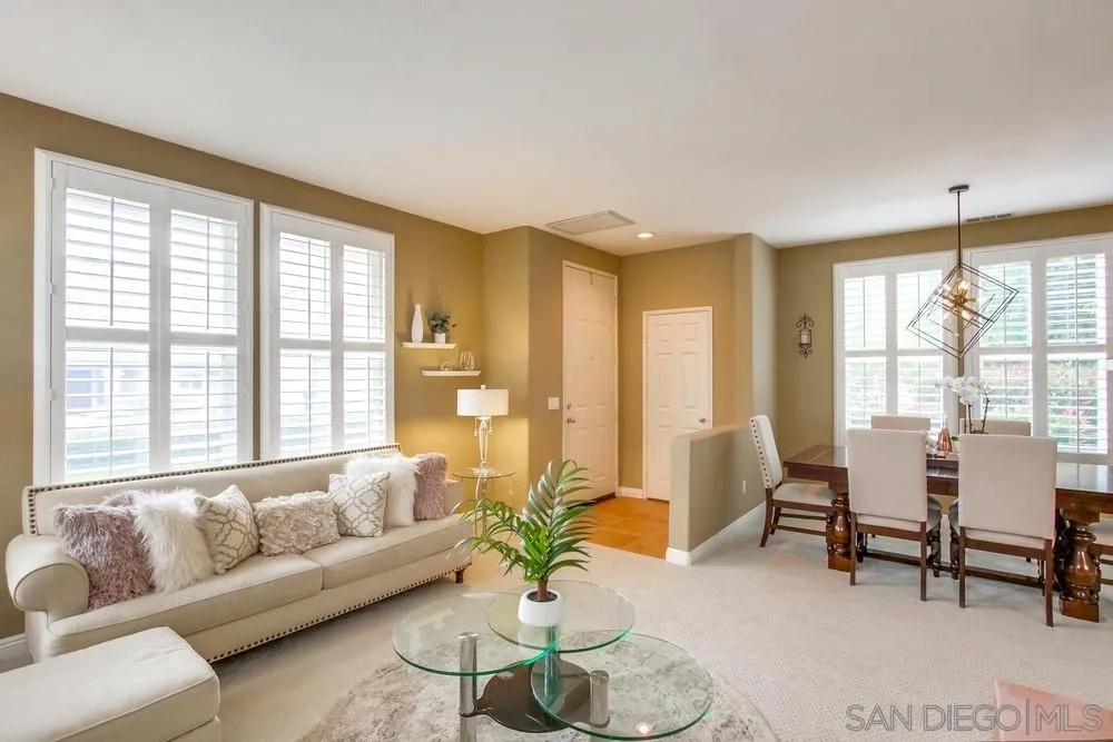 12237 Pepper Tree Lane Poway, CA 92064 - Photo 5 of 25 a living room with furniture and a large window