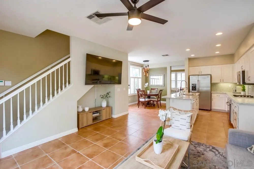 12237 Pepper Tree Lane Poway, CA 92064 - Photo 8 of 25 a living room with furniture and a flat screen tv