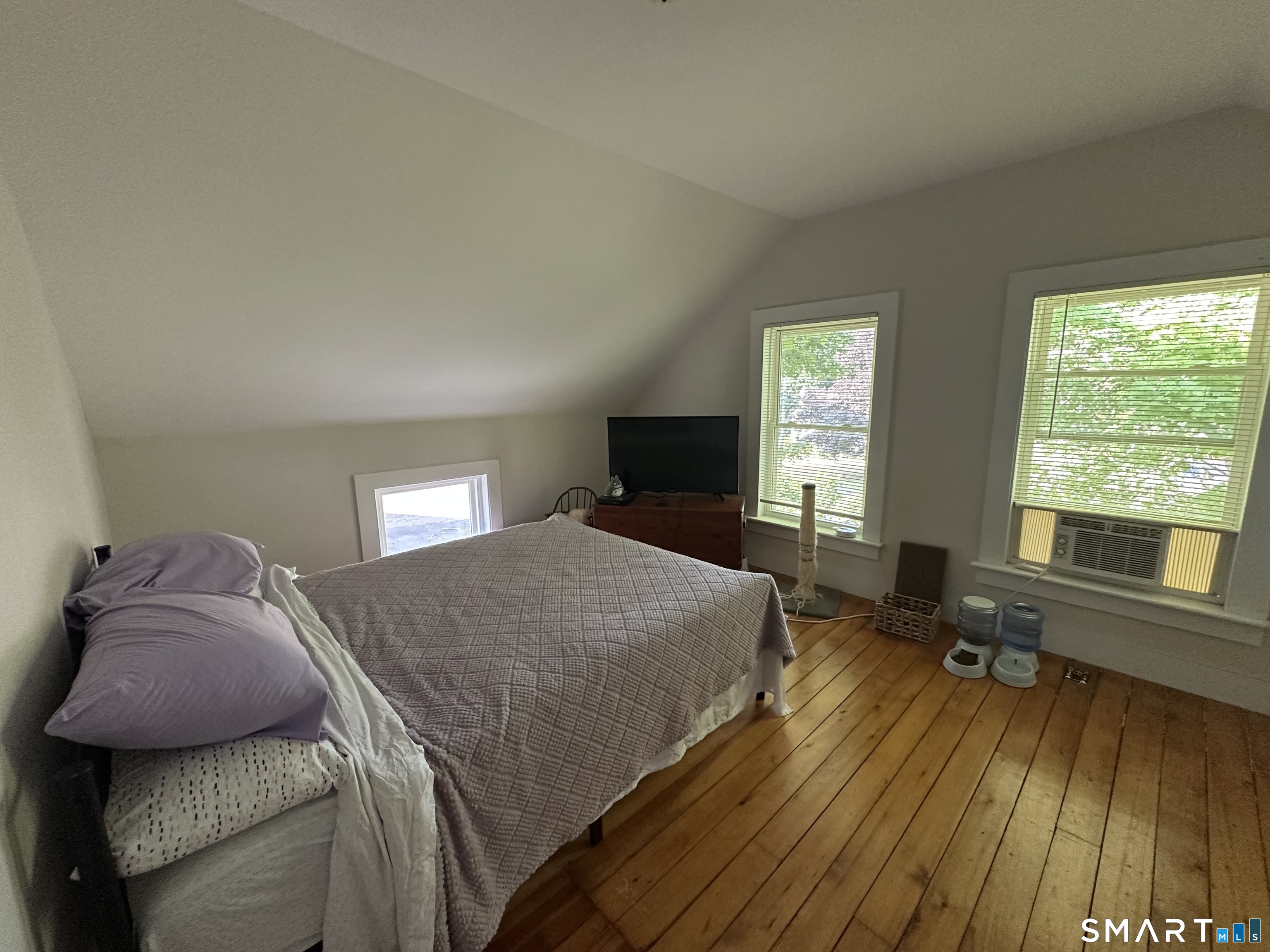 22 North Main Street, Unit 2 East Hampton, CT 06424 - Photo 10 of 17 Spacious bedroom with hardwood floors.