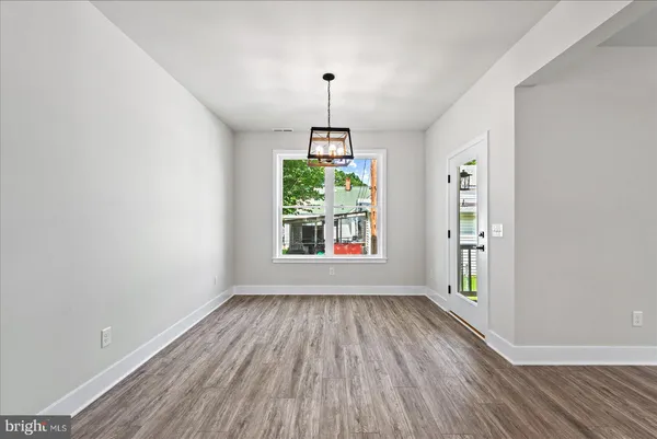 a bedroom with a bed and ceiling fan