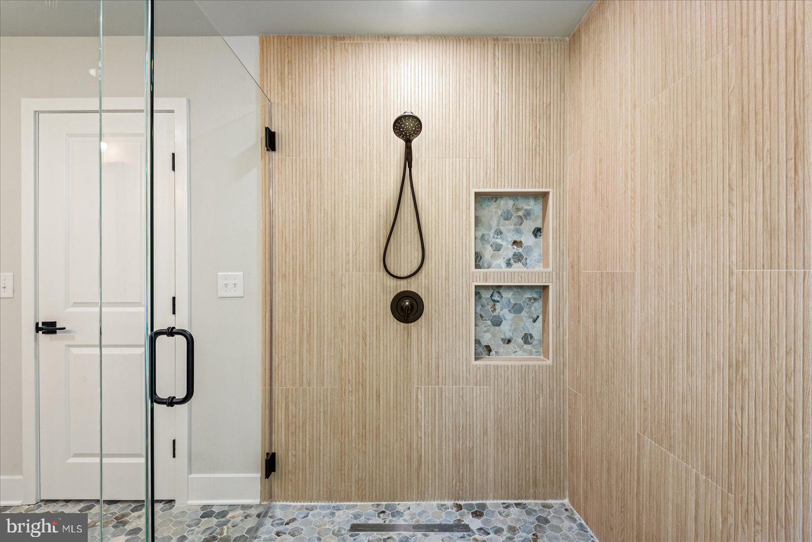 702 Taggart Street Colonial Beach, VA 22443 - Photo 27 of 64 a bathroom with a shower