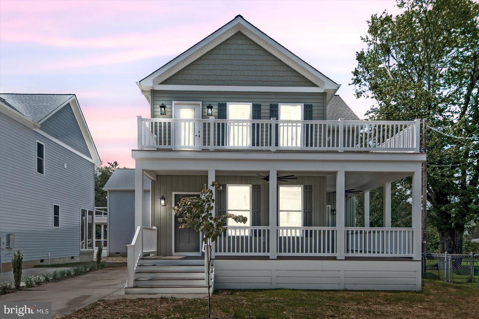702 Taggart Street Colonial Beach, VA 22443 - Photo 3 of 64 a front view of a house with entryway