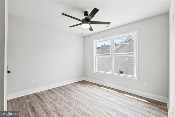 a view of a house with a yard and garage