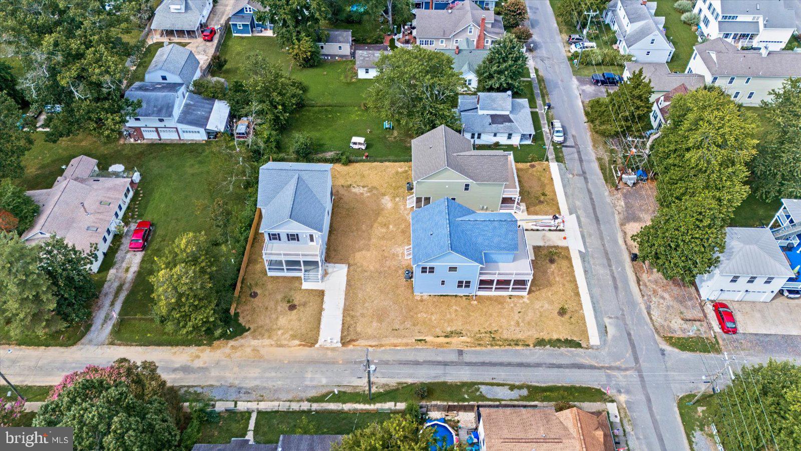 702 Taggart Street Colonial Beach, VA 22443 - Photo 53 of 64 an aerial view of residential houses with outdoor space and street view