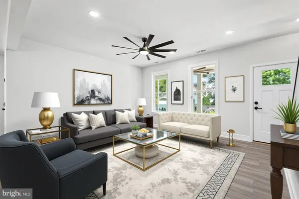 a kitchen with granite countertop a sink and stainless steel appliances